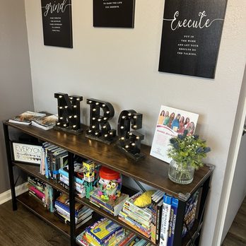 The Nutrition Nook - a bookshelf with books on it - Cafes Near Me - Tavares, Florida