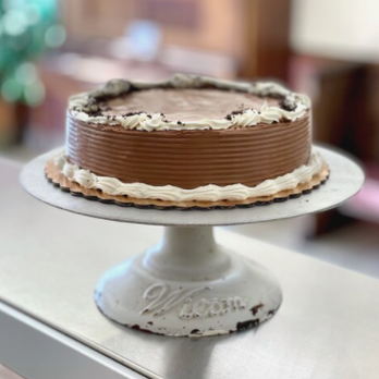 Lics Ice Cream Shop - a chocolate cake on a cake stand - Ice Cream & Frozen Yogurt Near Me - Calgary, Alberta Lics Ice Cream Shop - a chocolate cake on a cake stand - Ice Cream & Frozen Yogurt Near Me - Calgary, Alberta