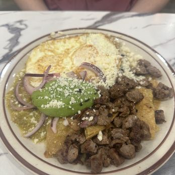 Sunny Day Cafe - Green chilaquiles w/ steak - Breakfast & Brunch Near Me - Carmel, Indiana Sunny Day Cafe - Green chilaquiles w/ steak - Breakfast & Brunch Near Me - Carmel, Indiana