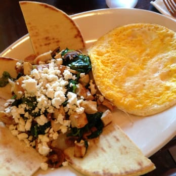Griddlecakes - Mushrooms, spinach, chicken and feta with pita bread and three eggs - American Near Me - Las Vegas, Nevada Griddlecakes - Mushrooms, spinach, chicken and feta with pita bread and three eggs - American Near Me - Las Vegas, Nevada