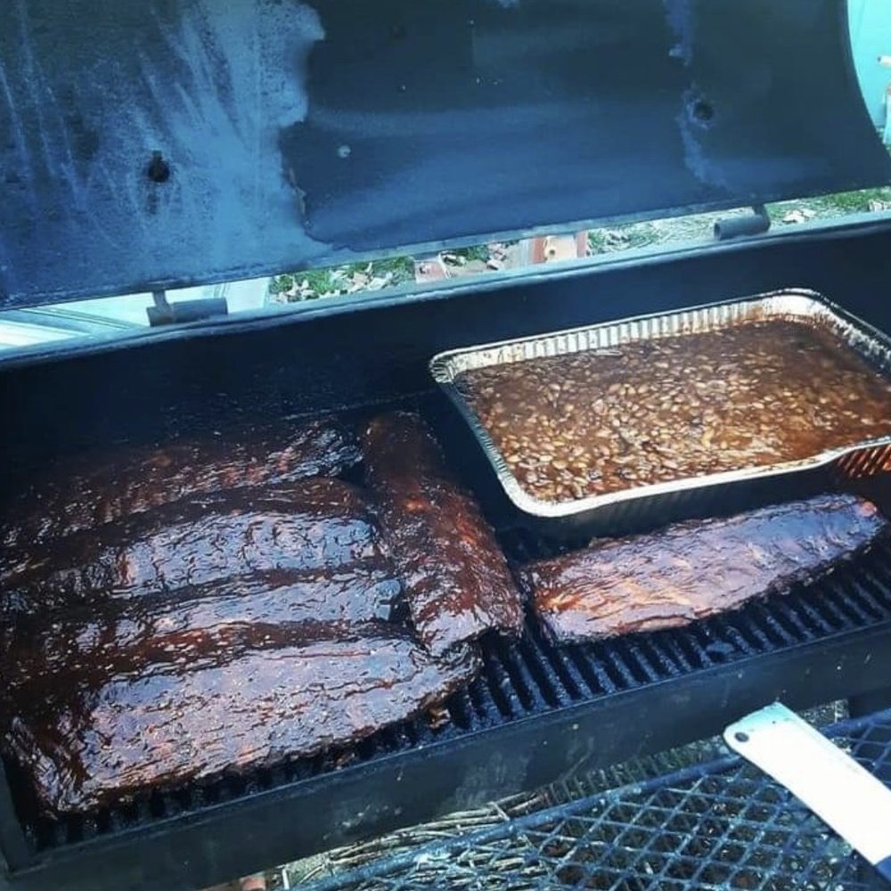 Jones Smokehouse BBQ - two barbecues cooking on a grill - Barbeque Near Me - Spokane, Washington Jones Smokehouse BBQ - two barbecues cooking on a grill - Barbeque Near Me - Spokane, Washington
