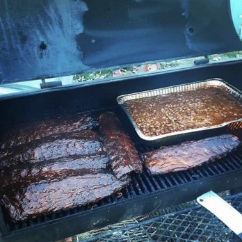 Jones Smokehouse BBQ - two barbecues cooking on a grill - Barbeque Near Me - Spokane, Washington Jones Smokehouse BBQ - two barbecues cooking on a grill - Barbeque Near Me - Spokane, Washington