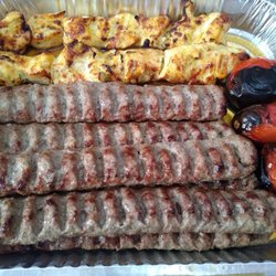 Persis Grill - Meats and grilled tomatoes.
