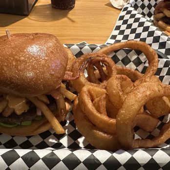 Grinderz - pigsty with onion rings - Burgers Near Me - Huntington Beach, California Grinderz - pigsty with onion rings - Burgers Near Me - Huntington Beach, California