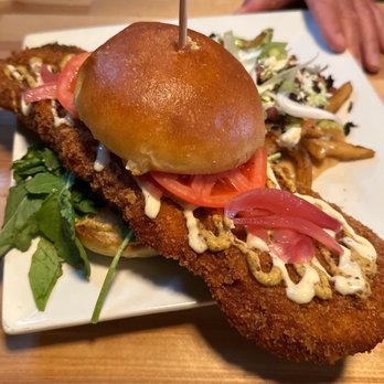 Underground Public House - Pork tenderloin sandwich with poutine fries - American Near Me - Carbondale, Illinois Underground Public House - Pork tenderloin sandwich with poutine fries - American Near Me - Carbondale, Illinois