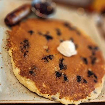 First Watch - a pancake with sausage and eggs - Breakfast & Brunch Near Me - Oakville, Missouri