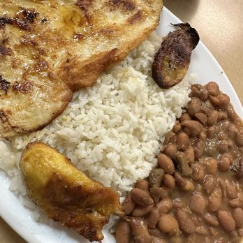 Cafe Y Algo Mas - Grilled chicken breast with rice and beans. The plantain was a delicious surprise. Not shown: my *just about licked* clean plate! - Bakeries Near Me - East Elmhurst, New York Cafe Y Algo Mas - Grilled chicken breast with rice and beans. The plantain was a delicious surprise. Not shown: my *just about licked* clean plate! - Bakeries Near Me - East Elmhurst, New York