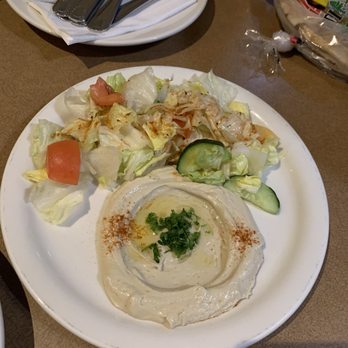Mr Kebab - Hummus and salad (part of mixed plate). You can see the pita is from a grocery store.. - Mediterranean Near Me - Redlands, California
