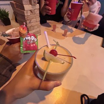 Holey Moley - Top & left side - sugar caddy Bottom middle - pina colada Top far right - cherry limeade - Mini Golf Near Me - San Francisco, California Holey Moley - Top & left side - sugar caddy Bottom middle - pina colada Top far right - cherry limeade - Mini Golf Near Me - San Francisco, California