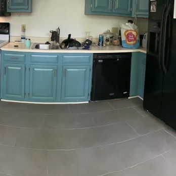 Jackson Construction - Tile floor in kitchen - General Contractors Near Me Jackson Construction - Tile floor in kitchen - General Contractors Near Me