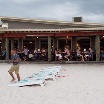 Surf Hut - Bean bag toss with lots for several groups - Seafood Near Me - Destin, Florida