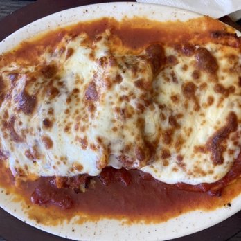 Adriatic Cafe Italian Grill - Pasta sampler.  It comes with lasagna, manicotti and ravioli topped with marinara and mozzarella - Italian Near Me - Katy, Texas