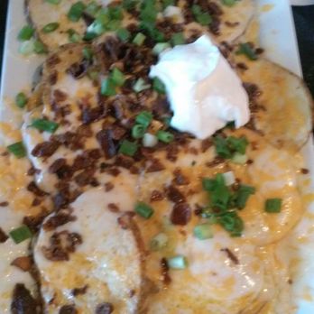 Hennessey's Tavern - Irish Nachos, pretty pathetic - Pubs Near Me - Dana Point, California Hennessey's Tavern - Irish Nachos, pretty pathetic - Pubs Near Me - Dana Point, California