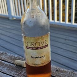 Grove Winery - Drinking strawberry wine and sitting on the dock over the pond