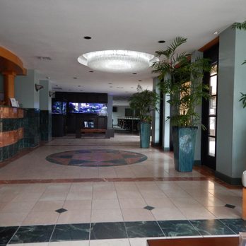 Ocean Park Inn - Here's the lobby. Beyond the salt water aquariums is plenty of breakfast seating. - Hotels Near Me - San Diego, California Ocean Park Inn - Here's the lobby. Beyond the salt water aquariums is plenty of breakfast seating. - Hotels Near Me - San Diego, California
