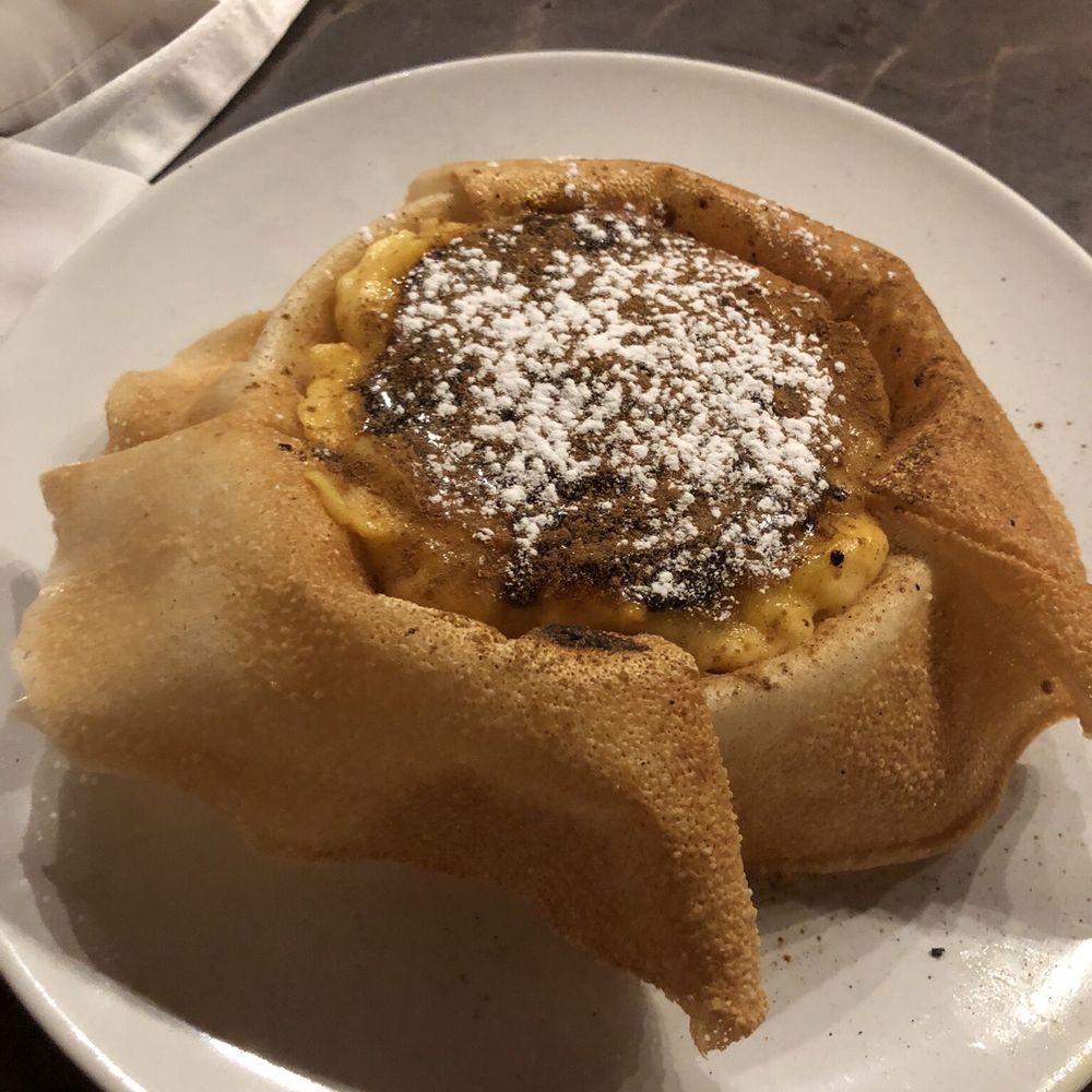 A Casa do Bacalhau - Pastel de nata combined with crema catalana - Bars Near Me - Lisbon, 11 A Casa do Bacalhau - Pastel de nata combined with crema catalana - Bars Near Me - Lisbon, 11