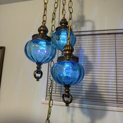 J & C Lighting - After the repair. Globes are too close together.
