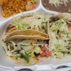 Tacos Burritos Y Más - Chicken, pork& lengua on flour with cheese, lettuce & tomatoes well SEASONED.  Food was cook to order Definitely will be back again.