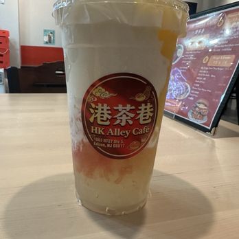 Hk Alley - A Mango Pomelo drink, size regular, as part of a Combo D. - Bubble Tea Near Me - Edison, New Jersey Hk Alley - A Mango Pomelo drink, size regular, as part of a Combo D. - Bubble Tea Near Me - Edison, New Jersey
