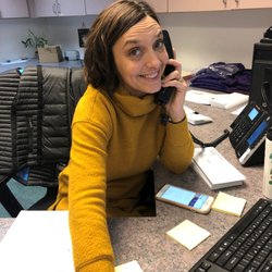 Home Instead - Angela Thomas, Owner, answering phones at the front desk today!