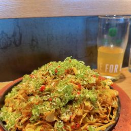 Gankara Yakisoba (with pork, extra spicy, extra veggies). Half-finished yuzu beer on side. Gankara Yakisoba (with pork, extra spicy, extra veggies). Half-finished yuzu beer on side.