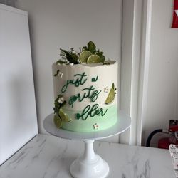 GoodieBox Bakeshop - Hugo Spritz themed cake. Vanilla cake with buttercream frosting and lime cream filling.