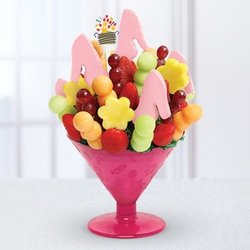 Edible Arrangements - Pineapple cut in a shape of heels and dipped in chocolate