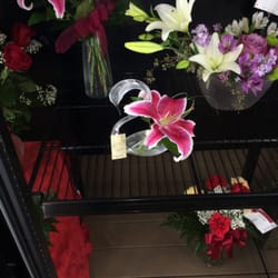An Enchanted Florist & Flower Delivery - Blown glass swan.