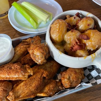 Firehouse Tavern - Wings with dry rub, celery, ranch and stuffed potato balls - American Near Me - Akron, Ohio