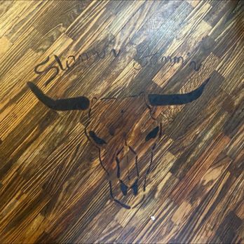Slammin Jammin BBQ - Floor of the restaurant with restaurant logo in it - Barbeque Near Me - Corning, New York Slammin Jammin BBQ - Floor of the restaurant with restaurant logo in it - Barbeque Near Me - Corning, New York