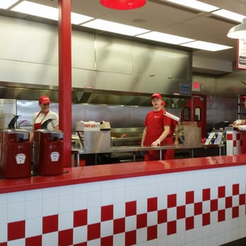 Five Guys - a fast food restaurant with red and white checkered counter - Burgers Near Me - Shrewsbury, Massachusetts