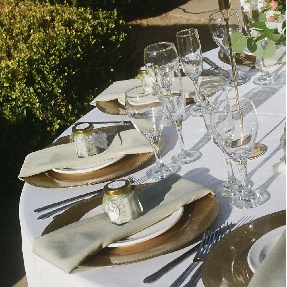 Mona Lisa Catering - Beautiful table set up. MaryAnn's team went the extra mile and placed our flower centerpieces out for us during our cocktail hour. - Caterers Near Me - Northridge, California