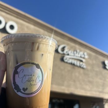 Cousins Coffee - iced honey bear latte with oat milk, topped w/ cinnamon! - Coffee & Tea Near Me - Peoria, Arizona