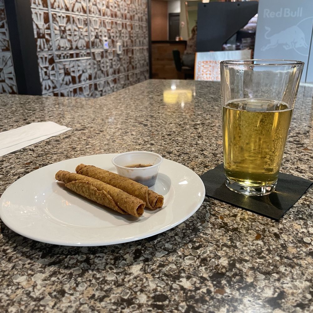 Complimentary drink and appetizer. Complimentary drink and appetizer.