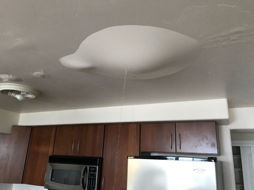 Slide of Titan Roofing & Rain Gutters Inc.