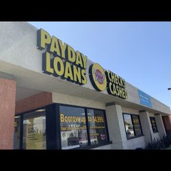 Money Mart - Side of store location facing Chapman