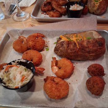 The Deck Down Under - Fried shrimp, loaded baked potato and vinegar cole slaw - Seafood Near Me - Jerome, Michigan The Deck Down Under - Fried shrimp, loaded baked potato and vinegar cole slaw - Seafood Near Me - Jerome, Michigan