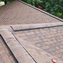 Slide of Reveille Roofing