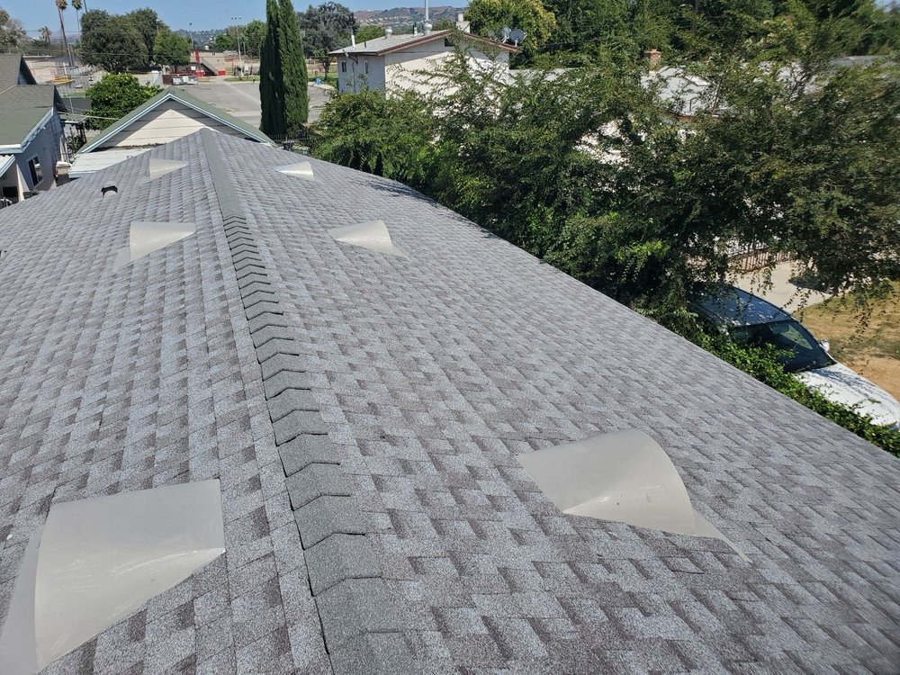 Slide of King Guard Roofing