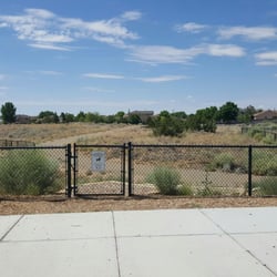 Bud Warren and Lady Dog Park - As seen from N staging area, walking path with some of the big dog side visible on L, and most of the small dog side on R.