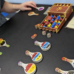 Zander's Game House - Potion Explosion uses marbles to determine what ingredients you have for making potions.