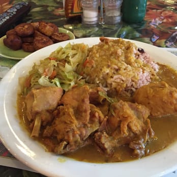 Negril Caribbean Restaurant - Curried chicken, with rice and cabbage. Side order of grilled plantains. - Caribbean Near Me - Junction City, Kansas Negril Caribbean Restaurant - Curried chicken, with rice and cabbage. Side order of grilled plantains. - Caribbean Near Me - Junction City, Kansas