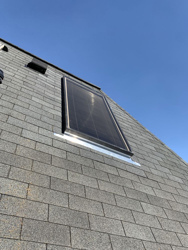 Slide of J & J Roofing