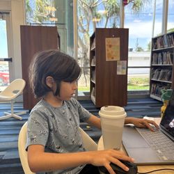 Lantana Public Library - My son playing Minecraft