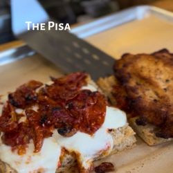 Lunch Sandwich Shop - The Pisa - Our hot Chicken Parm with Chicken Cutlet, Melted Mozzarella, Roasted Tomatoes, Red Pesto