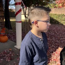 Smyrna Barber Shop - John showing off his new hairstyle!