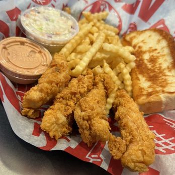 Raising Cane's Chicken Fingers - Chicken finger combo with coleslaw, fries, Texas toast and Cane's sauce. - Fast Food Near Me - Marlborough, Massachusetts Raising Cane's Chicken Fingers - Chicken finger combo with coleslaw, fries, Texas toast and Cane's sauce. - Fast Food Near Me - Marlborough, Massachusetts