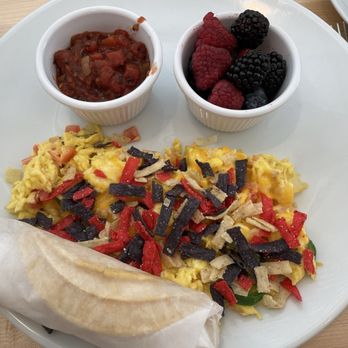 Eggsquisite Cafe - Migas with fruit instead of hash browns. Delicious and took some home. - Breakfast & Brunch Near Me - Fort Worth, Texas