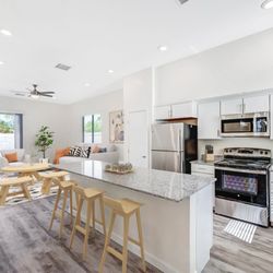 Quarter North by Greystar - Kitchen and Living Room