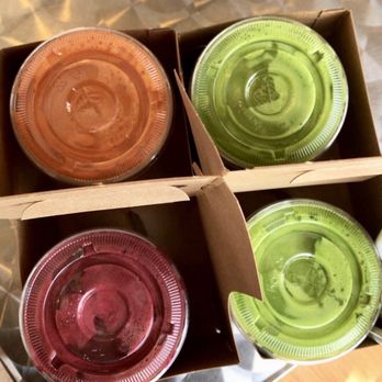 Impact Juice Bar - Top: Golden Fuel, Glowing Green Bottom: Happy Liver, Glowing Green - Juice Bars & Smoothies Near Me - Orange, California Impact Juice Bar - Top: Golden Fuel, Glowing Green Bottom: Happy Liver, Glowing Green - Juice Bars & Smoothies Near Me - Orange, California